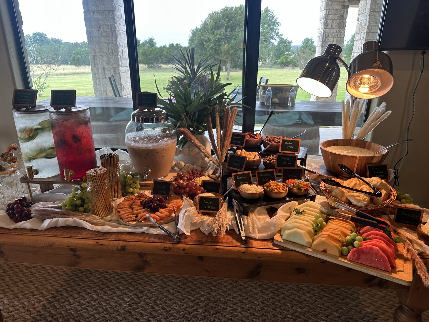 A long spread of food and drinks prepared for guests at the Founders Day Retreat.