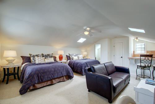 A shared bedroom at Luna Rio with two beds, close to the gathering and still tucked away.